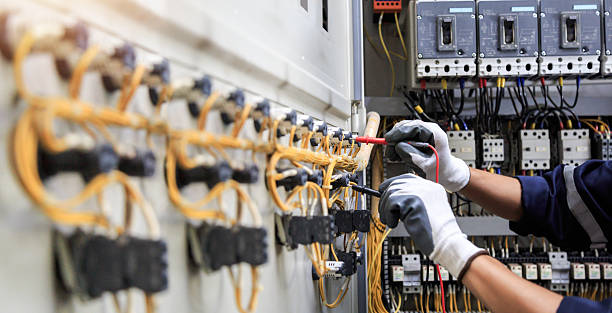 Professional Electrician technician working in Armonk, NY